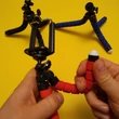 Telefontartó tripod miniállvány „polip" hajlítható lábakkal, tartókerettel - kék (több színben, bleutooth elsütő is kapható hozzá)