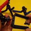 Telefontartó tripod miniállvány „polip" hajlítható lábakkal, tartókerettel - kék (több színben, bleutooth elsütő is kapható hozzá)