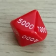 Közeli kép - tízoldalú kocka ezresekkel számozva - számoláshoz - műveletekhez - matematika- és idegen nyelvi órán - piros