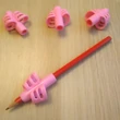 Fejlesztő- és gyógypedagógiai foglalkozásokhoz – Ergonomikus ceruzafogó – rózsaszín (pink)