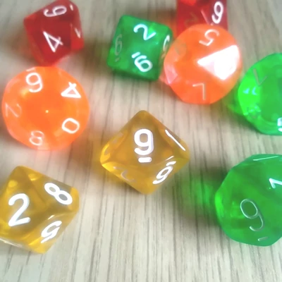 Tízoldalú kocka játékos feladatokhoz, csapatépítéshez, 0-9-ig számozva, áttetsző sárga szín